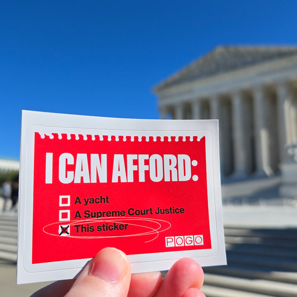 Red sticker with a checkbox list in front of the Supreme Court. Text: I can afford: A yacht; A Supreme Court Justice; This sticker. This sticker is checked.